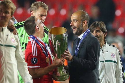 PRAGUE, CZECH REPUBLIC - AUGUST 30: Franck Ribery of Bayern Muenchen celebrates with his head coach Pep Guardiola after winning the UEFA Super Cup between FC Bayern Muenchen and Chelsea FC at Stadion Eden on August 30, 2013 in Prague, Czech Republic. (Photo by Alexander Hassenstein/Bongarts/Getty Images) PRAGUE, CZECH REPUBLIC - AUGUST 30: Franck Ribery of Bayern Muenchen celebrates with his head coach Pep Guardiola after winning the UEFA Super Cup between FC Bayern Muenchen and Chelsea FC at Stadion Eden on August 30, 2013 in Prague, Czech Republic. (Photo by Alexander Hassenstein/Bongarts/Getty Images)