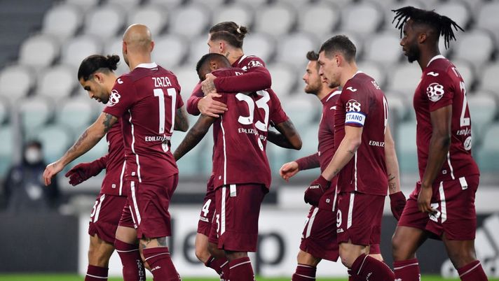 TURIN, ITALY - DECEMBER 05: Nkoulou Nicolas of Torino FC celebrates with teammate Lyanco Vojnovic after scoring his team's first goal after scoring his team's first goal during the Serie A match between Juventus and Torino FC at Allianz Stadium on December 05, 2020 in Turin, Italy. Football Stadiums around Italy remain empty due to the Coronavirus Pandemic as Government social distancing laws prohibit fans inside venues resulting in fixtures being played behind closed doors. (Photo by Valerio Pennicino/Getty Images) TURIN, ITALY - DECEMBER 05: Nkoulou Nicolas of Torino FC celebrates with teammate Lyanco Vojnovic after scoring his team's first goal after scoring his team's first goal during the Serie A match between Juventus and Torino FC at Allianz Stadium on December 05, 2020 in Turin, Italy. Football Stadiums around Italy remain empty due to the Coronavirus Pandemic as Government social distancing laws prohibit fans inside venues resulting in fixtures being played behind closed doors. (Photo by Valerio Pennicino/Getty Images)