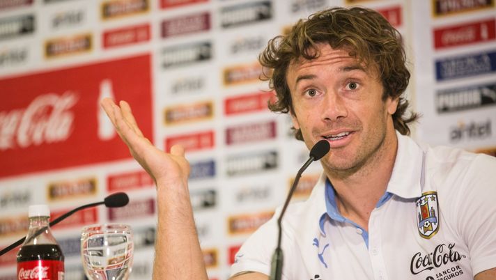 NATAL, BRAZIL - JUNE 25: Diego Lugano of Uruguay gestures during a press conference at the Sehrs Natal Grand Hotel in Natal on June 25, 2014 in Natal, Brazil. (Photo by Diego Marcel/Getty Images) Benzema