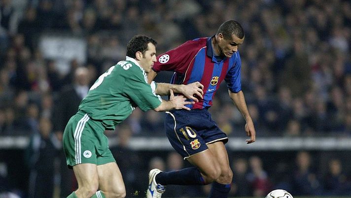 9 Apr 2002: Rivaldo of Barcelona and Ioannis Goumas of Panathinaikos in action during the Champions League quarter final, 2nd leg match between Barcelona and Panathinaikos at the Nou Camp Stadium, Barcelona, Spain. DIGITAL IMAGE Mandatory Credit: Gary M.Prior/Getty Images 