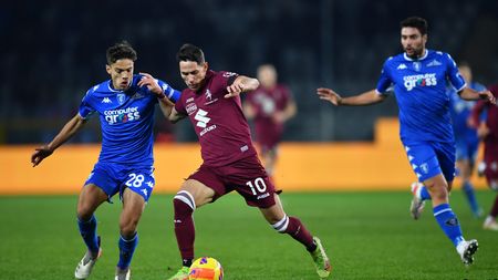 TURIN, ITALY - DECEMBER 02: Sasa Lukic of Torino FC battles for possession with Samuele Ricci of Empoli during the Serie A match between Torino FC and Empoli FC at Stadio Olimpico di Torino on December 02, 2021 in Turin, Italy. (Photo by Valerio Pennicino/Getty Images)