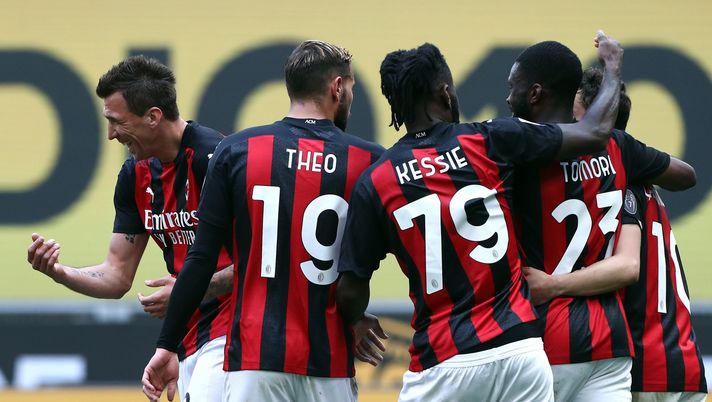 MILAN, ITALY - APRIL 18: Fikayo Tomori of A.C. Milan celebrates their team's second goal with team mates, an own goal scored by Gianluca Scamacca of Genoa (not in picture) during the Serie A match between AC Milan and Genoa CFC at Stadio Giuseppe Meazza on April 18, 2021 in Milan, Italy. Sporting stadiums around Italy remain under strict restrictions due to the Coronavirus Pandemic as Government social distancing laws prohibit fans inside venues resulting in games being played behind closed doors. (Photo by Marco Luzzani/Getty Images) MILAN, ITALY - APRIL 18: Fikayo Tomori of A.C. Milan celebrates their team's second goal with team mates, an own goal scored by Gianluca Scamacca of Genoa (not in picture) during the Serie A match between AC Milan and Genoa CFC at Stadio Giuseppe Meazza on April 18, 2021 in Milan, Italy. Sporting stadiums around Italy remain under strict restrictions due to the Coronavirus Pandemic as Government social distancing laws prohibit fans inside venues resulting in games being played behind closed doors. (Photo by Marco Luzzani/Getty Images)