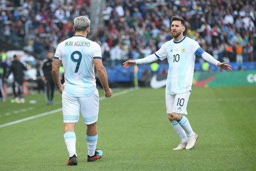 SAO PAULO, BRAZIL - JULY 06: Sergio Aguero of Argentina celebrates after scoring the opening goal with teammate Lionel Messi during the Copa America Brazil 2019 Third Place match between Argentina and Chile at Arena Corinthians on July 06, 2019 in Sao Paulo, Brazil. (Photo by Alexandre Schneider/Getty Images) SAO PAULO, BRAZIL - JULY 06: Sergio Aguero of Argentina celebrates after scoring the opening goal with teammate Lionel Messi during the Copa America Brazil 2019 Third Place match between Argentina and Chile at Arena Corinthians on July 06, 2019 in Sao Paulo, Brazil. (Photo by Alexandre Schneider/Getty Images)