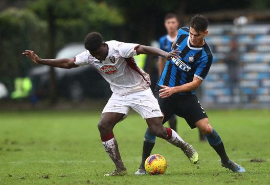 SESTO SAN GIOVANNI, ITALY - NOVEMBER 23: Ndary Michel Adopo of Torino FC competes for the ball with Riccardo Burgio of FC Internazionale during the Primavera 1 match between FC Internazionale U19 and Torino FC U19 at Stadio Breda on November 23, 2019 in Sesto San Giovanni, Italy. (Photo by Marco Luzzani - Inter/Inter via Getty Images) SESTO SAN GIOVANNI, ITALY - NOVEMBER 23: Ndary Michel Adopo of Torino FC competes for the ball with Riccardo Burgio of FC Internazionale during the Primavera 1 match between FC Internazionale U19 and Torino FC U19 at Stadio Breda on November 23, 2019 in Sesto San Giovanni, Italy. (Photo by Marco Luzzani - Inter/Inter via Getty Images)
