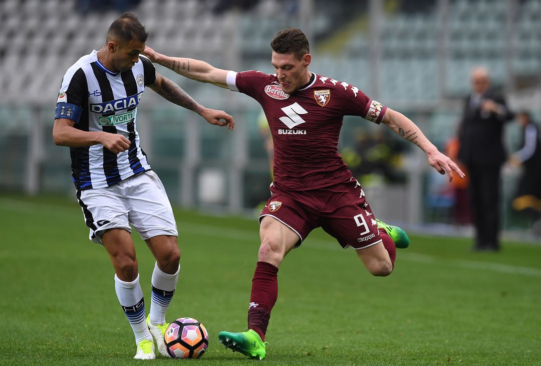  TURIN, ITALY - APRIL 02:  Andrea Belotti (R) of FC Torino is challenged by Larangeira Danilo of Udinese Calcio during the Serie A match between FC Torino and Udinese Calcio at Stadio Olimpico di Torino on April 2, 2017 in Turin, Italy.  (Photo by Valerio Pennicino/Getty Images) 