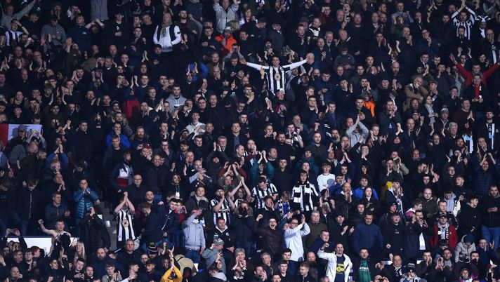 WEST BROMWICH, ENGLAND - MARCH 03: Newcastle United fans celebrate during the FA Cup Fifth Round match between West Bromwich Albion and Newcastle United at The Hawthorns on March 03, 2020 in West Bromwich, England. (Photo by Nathan Stirk/Getty Images) WEST BROMWICH, ENGLAND - MARCH 03: Newcastle United fans celebrate during the FA Cup Fifth Round match between West Bromwich Albion and Newcastle United at The Hawthorns on March 03, 2020 in West Bromwich, England. (Photo by Nathan Stirk/Getty Images)