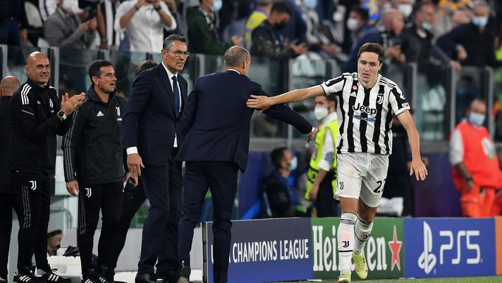 TURIN, ITALY - SEPTEMBER 29: Federico Chiesa of Juventus celebrates after scoring their side's first goal with Massimiliano Allegri, Head Coach of Juventus during the UEFA Champions League group H match between Juventus and Chelsea FC at the Juventus Stadium on September 29, 2021 in Turin, Italy. (Photo by Valerio Pennicino/Getty Images) TURIN, ITALY - SEPTEMBER 29: Federico Chiesa of Juventus celebrates after scoring their side's first goal with Massimiliano Allegri, Head Coach of Juventus during the UEFA Champions League group H match between Juventus and Chelsea FC at the Juventus Stadium on September 29, 2021 in Turin, Italy. (Photo by Valerio Pennicino/Getty Images)