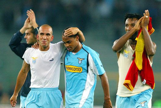 ROME - OCTOBER 27: Christian Manfredini #17, Paolo Di Canio #9 and Claudio De Sousa #44 of Lazio celebrate winning the Seria A match between Lazio and Messina 2-0 on October 27, 2004 at the Stadio Olimpico in Rome, Italy. (Photo by New Press/Getty Images) ROME - OCTOBER 27: Christian Manfredini #17, Paolo Di Canio #9 and Claudio De Sousa #44 of Lazio celebrate winning the Seria A match between Lazio and Messina 2-0 on October 27, 2004 at the Stadio Olimpico in Rome, Italy. (Photo by New Press/Getty Images)