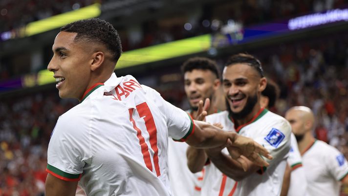 DOHA, QATAR - NOVEMBER 27: Abdelhamid Sabiri (L) of Morocco celebrates after scoring their team's first goal with their teammates during the FIFA World Cup Qatar 2022 Group F match between Belgium and Morocco at Al Thumama Stadium on November 27, 2022 in Doha, Qatar. (Photo by Buda Mendes/Getty Images) Sabiri