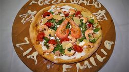 Arriva la “pizza Cheddira”, il ristorante di casa celebra il bomber Walid