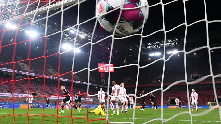 COLOGNE, GERMANY - DECEMBER 16: Florian Wirtz of Bayer Leverkusen celebrates after scoring their team's fourth goal during the Bundesliga match between 1. FC Koeln and Bayer 04 Leverkusen at RheinEnergieStadion on December 16, 2020 in Cologne, Germany. Sporting stadiums around Germany remain under strict restrictions due to the Coronavirus Pandemic as Government social distancing laws prohibit fans inside venues resulting in games being played behind closed doors. (Photo by Sascha Steinbach - Pool/Getty Images) COLOGNE, GERMANY - DECEMBER 16: Florian Wirtz of Bayer Leverkusen celebrates after scoring their team's fourth goal during the Bundesliga match between 1. FC Koeln and Bayer 04 Leverkusen at RheinEnergieStadion on December 16, 2020 in Cologne, Germany. Sporting stadiums around Germany remain under strict restrictions due to the Coronavirus Pandemic as Government social distancing laws prohibit fans inside venues resulting in games being played behind closed doors. (Photo by Sascha Steinbach - Pool/Getty Images)