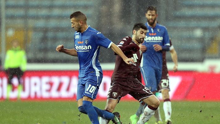 EMPOLI, ITALY - FEBRUARY 05: Omar El Kaddouri of Empoli FC battles for the ball with Marco Benassi of FC Torino during the Serie A match between Empoli FC and FC Torino at Stadio Carlo Castellani on February 5, 2017 in Empoli, Italy.  (Photo by Gabriele Maltinti/Getty Images) 