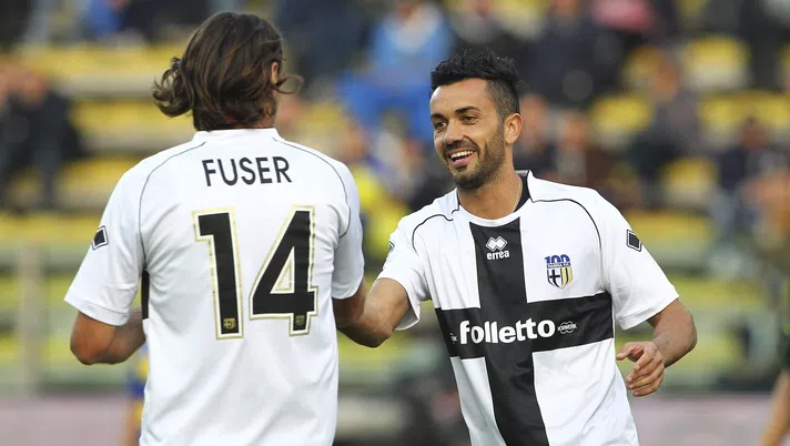 PARMA, ITALY - OCTOBER 13:  Raffaele Palladino (R) of Stelle Crociate celebrates his goal with team-mate Diego Fuser (L) during the 100 Years Anniversary match between Stelle Crociate and US Stelle Gialloblu at Stadio Ennio Tardini on October 13, 2013 in Parma, Italy.  (Photo by Marco Luzzani/Getty Images)