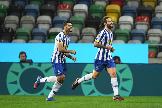  AVEIRO, PORTUGAL - DECEMBER 23: Sergio Oliveira of FC Porto celebrates after scoring their sides first goal during the Portuguese Super Cup final between FC Porto and SL Benfica at Estadio Municipal de Aveiro on December 23, 2020 in Aveiro, Portugal. Sporting stadiums around Portugal remain under strict restrictions due to the Coronavirus Pandemic as Government social distancing laws prohibit fans inside venues resulting in games being played behind closed doors. (Photo by Octavio Passos/Getty Images) 
