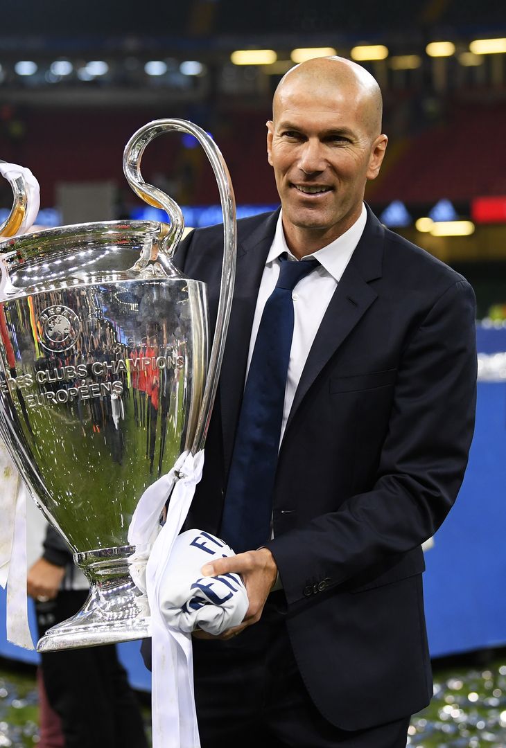  CARDIFF, WALES - JUNE 03: Zinedine Zidane, Manager of Real Madrid poses with the Champions League trophy after the UEFA Champions League Final between Juventus and Real Madrid at National Stadium of Wales on June 3, 2017 in Cardiff, Wales.  (Photo by Matthias Hangst/Getty Images) 