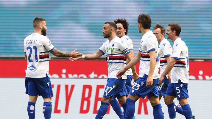 MILAN, ITALY - APRIL 03: Fabio Quagliarella of U.C. Sampdoria celebrates with teammates after scoring their team's first goal during the Serie A match between AC Milan and UC Sampdoria at Stadio Giuseppe Meazza on April 03, 2021 in Milan, Italy. Sporting stadiums around Italy remain under strict restrictions due to the Coronavirus Pandemic as Government social distancing laws prohibit fans inside venues resulting in games being played behind closed doors. (Photo by Marco Luzzani/Getty Images) MILAN, ITALY - APRIL 03: Fabio Quagliarella of U.C. Sampdoria celebrates with teammates after scoring their team's first goal during the Serie A match between AC Milan and UC Sampdoria at Stadio Giuseppe Meazza on April 03, 2021 in Milan, Italy. Sporting stadiums around Italy remain under strict restrictions due to the Coronavirus Pandemic as Government social distancing laws prohibit fans inside venues resulting in games being played behind closed doors. (Photo by Marco Luzzani/Getty Images)