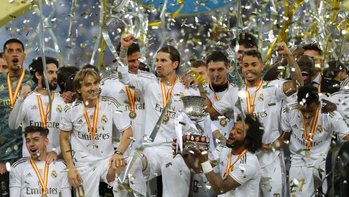 JEDDAH, SAUDI ARABIA - JANUARY 12: Sergio Ramos of Real Madrid lifts the trophy with his team after his teams victory in the Supercopa de Espana Final match between Real Madrid and Club Atletico de Madrid at King Abdullah Sports City on January 12, 2020 in Jeddah, Saudi Arabia. (Photo by Francois Nel/Getty Images) JEDDAH, SAUDI ARABIA - JANUARY 12: Sergio Ramos of Real Madrid lifts the trophy with his team after his teams victory in the Supercopa de Espana Final match between Real Madrid and Club Atletico de Madrid at King Abdullah Sports City on January 12, 2020 in Jeddah, Saudi Arabia. (Photo by Francois Nel/Getty Images)