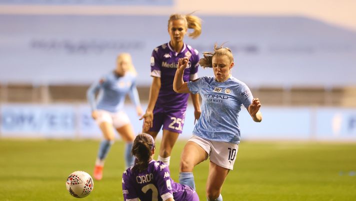 MANCHESTER, ENGLAND - MARCH 03: Georgia Stanway of Manchester City is challenged by Janelle Cordia of ACF Fiorentina  (Photo by Naomi Baker/Getty Images) 