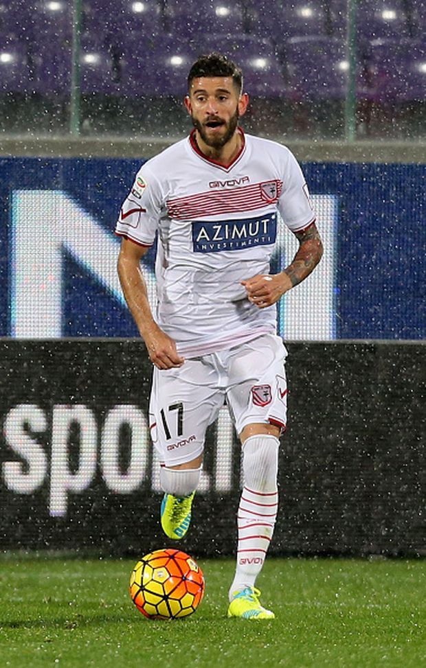 Davide Astori of Fiorentina competes for the ball with Kevin Lasagna of Carpi during the Serie A match between ACF Fiorentina and Carpi FC at Stadio Artemio Franchi on February 3, 2016 in Florence, Italy. 