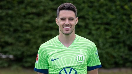 WOLFSBURG, GERMANY - JULY 06: Josip Brekalo of VfL Wolfsburg poses during the team presentation at Volkswagen Arena on July 6, 2022 in Wolfsburg, Germany. (Photo by Ronny Hartmann/Getty Images)