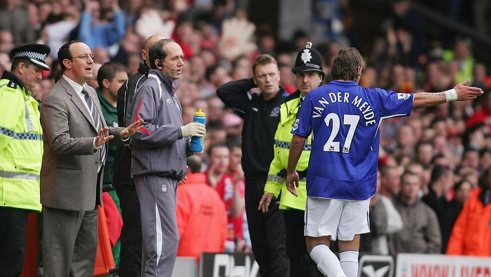 LIVERPOOL, UNITED KINGDOM - MARCH 25: Liverpool manager Rafael Benitez and Everton manager David Moyes look on as Andy Van Der Meyde of Everton leaves the field after being sent off during the Barclays Premiership match between Liverpool and Everton at Anfield on March 25, 2006 in Liverpool, England. (Photo by Michael Steele/Getty Images) LIVERPOOL, UNITED KINGDOM - MARCH 25: Liverpool manager Rafael Benitez and Everton manager David Moyes look on as Andy Van Der Meyde of Everton leaves the field after being sent off during the Barclays Premiership match between Liverpool and Everton at Anfield on March 25, 2006 in Liverpool, England. (Photo by Michael Steele/Getty Images)