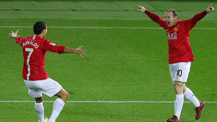 YOKOHAMA, JAPAN - DECEMBER 21: Wayne Rooney (R) of Manchester United celebrates scoring their first goal with teammate Cristiano Ronaldo during the FIFA Club World Cup Japan 2008 final match between Manchester United and Liga de Quito at the International Stadium Yokohama on December 21, 2008 in Yokohama, Kanagawa, Japan. (Photo by Kiyoshi Ota/Getty Images) YOKOHAMA, JAPAN - DECEMBER 21: Wayne Rooney (R) of Manchester United celebrates scoring their first goal with teammate Cristiano Ronaldo during the FIFA Club World Cup Japan 2008 final match between Manchester United and Liga de Quito at the International Stadium Yokohama on December 21, 2008 in Yokohama, Kanagawa, Japan. (Photo by Kiyoshi Ota/Getty Images)