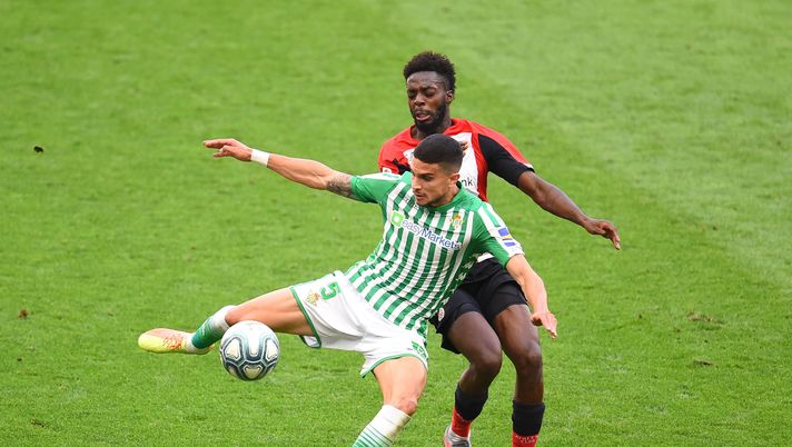 BILBAO, SPAIN - JUNE 20: Marc Bartra of Real Betis Balompie is challenged by Inaki Williams of Athletic Bilbao during the Liga match between Athletic Club and Real Betis Balompie at San Mames Stadium on June 20, 2020 in Bilbao, Spain. Football Stadiums around Europe remain empty due to the Coronavirus Pandemic as Government social distancing laws prohibit fans inside venues resulting in all fixtures being played behind closed doors. (Photo by Juan Manuel Serrano Arce/Getty Images) BILBAO, SPAIN - JUNE 20: Marc Bartra of Real Betis Balompie is challenged by Inaki Williams of Athletic Bilbao during the Liga match between Athletic Club and Real Betis Balompie at San Mames Stadium on June 20, 2020 in Bilbao, Spain. Football Stadiums around Europe remain empty due to the Coronavirus Pandemic as Government social distancing laws prohibit fans inside venues resulting in all fixtures being played behind closed doors. (Photo by Juan Manuel Serrano Arce/Getty Images)