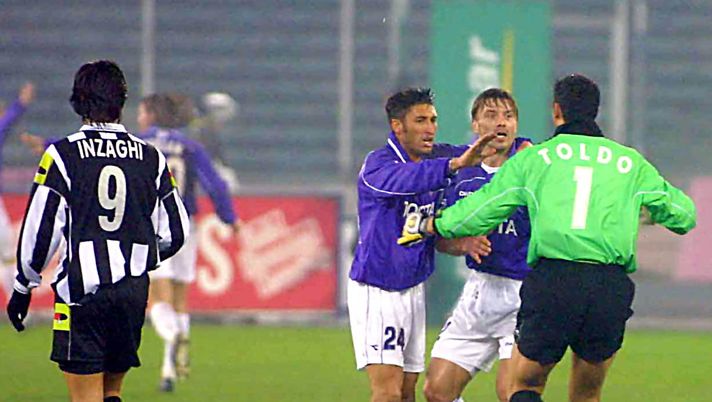 6 Jan 2001: Filippo Inzaghi of Juventus (left) looks on as Francesco Toldo, Tomas Repka and Christian Amoroso of Fiorentina celebrate scoring a goal during the Serie A 13th round league match between Juventus and Fiorentina played at the Delle Alpi Stadium, Turin. Mandatory Credit: Grazia Neri/ALLSPORT 6 Jan 2001: Filippo Inzaghi of Juventus (left) looks on as Francesco Toldo, Tomas Repka and Christian Amoroso of Fiorentina celebrate scoring a goal during the Serie A 13th round league match between Juventus and Fiorentina played at the Delle Alpi Stadium, Turin. Mandatory Credit: Grazia Neri/ALLSPORT