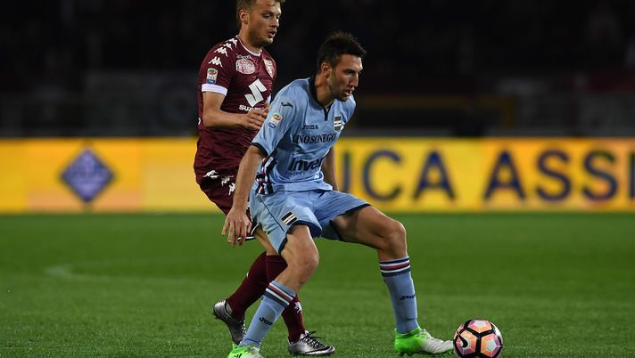 TURIN, ITALY - APRIL 29:  Adem Ljajic (L) of FC Torino competes with Vasco Regini of UC Sampdoria during the Serie A match between FC Torino and UC Sampdoria at Stadio Olimpico di Torino on April 29, 2017 in Turin, Italy.  (Photo by Valerio Pennicino/Getty Images) 