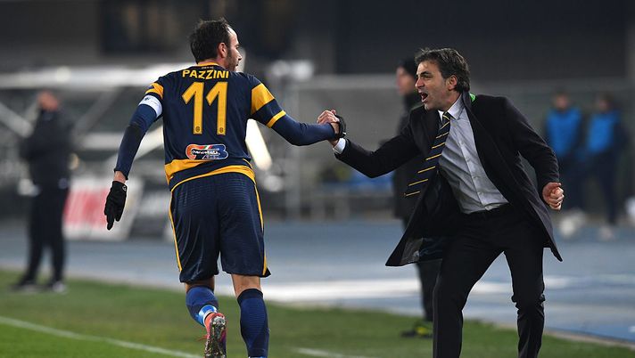 Giampaolo Pazzini (L) of Hellas Verona FC celebrates the opening goal with his head coach Fabio Pecchia  