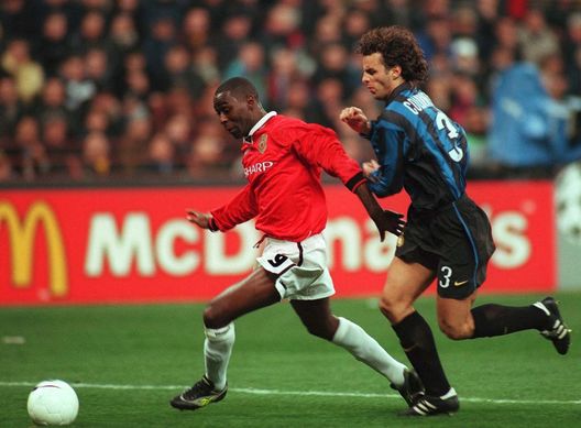 MILAN, ITALY - MARCH 17: CHAMPIONS LEAGUE 98/99 Mailand; INTER MAILAND - MANCHESTER UNITED 1:1; Dwight YORKE/Manchester United, F. COLONNESE/Inter Mailand (Photo by Henri Szwarc/Bongarts/Getty Images) MILAN, ITALY - MARCH 17: CHAMPIONS LEAGUE 98/99 Mailand; INTER MAILAND - MANCHESTER UNITED 1:1; Dwight YORKE/Manchester United, F. COLONNESE/Inter Mailand (Photo by Henri Szwarc/Bongarts/Getty Images)