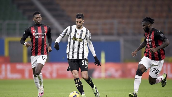 MILAN, ITALY - JANUARY 06: Rodrigo Bentancur of Juventus competes for the ball with Rafael Leao (L) and Franck Kessie (R) of AC Milan during the Serie A match between AC Milan and Juventus at Stadio Giuseppe Meazza on January 06, 2021 in Milan, Italy. Sporting stadiums around Italy remain under strict restrictions due to the Coronavirus Pandemic as Government social distancing laws prohibit fans inside venues resulting in games being played behind closed doors. (Photo by Daniele Badolato - Juventus FC/Juventus FC via Getty Images) MILAN, ITALY - JANUARY 06: Rodrigo Bentancur of Juventus competes for the ball with Rafael Leao (L) and Franck Kessie (R) of AC Milan during the Serie A match between AC Milan and Juventus at Stadio Giuseppe Meazza on January 06, 2021 in Milan, Italy. Sporting stadiums around Italy remain under strict restrictions due to the Coronavirus Pandemic as Government social distancing laws prohibit fans inside venues resulting in games being played behind closed doors. (Photo by Daniele Badolato - Juventus FC/Juventus FC via Getty Images)