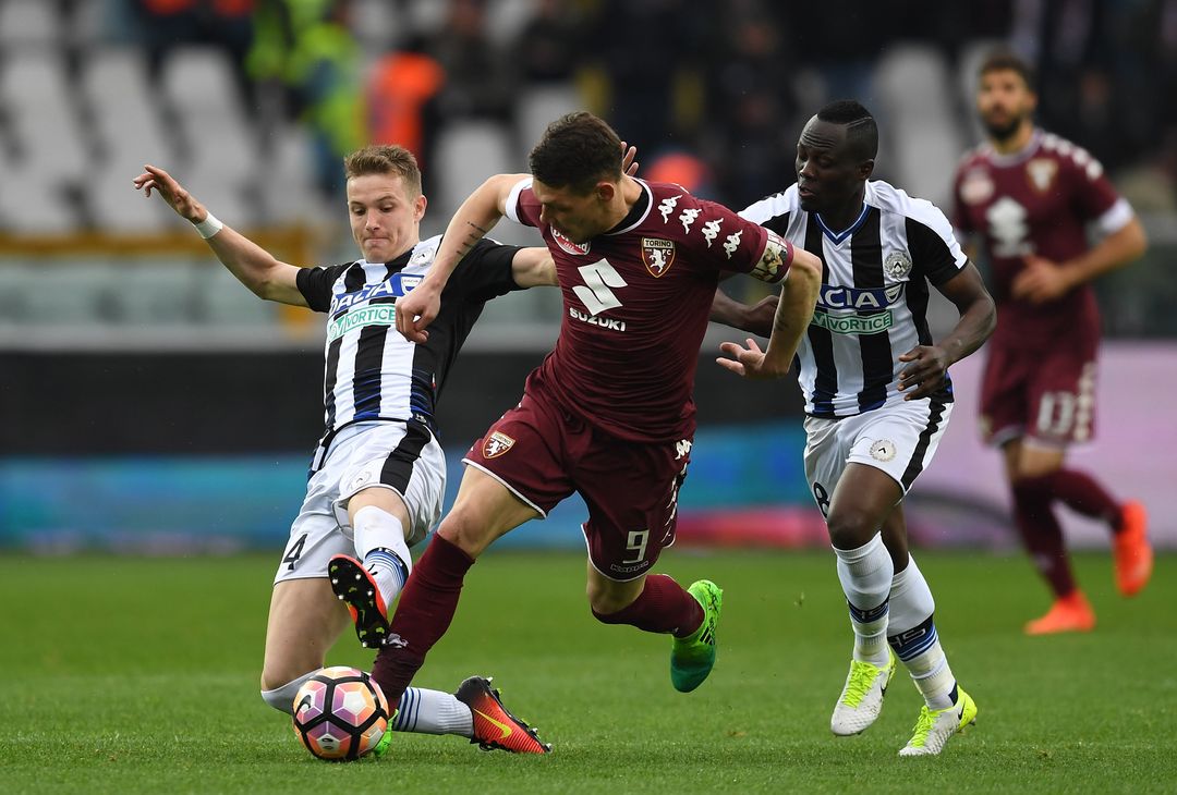  TURIN, ITALY - APRIL 02:  Andrea Belotti (C) of FC Torino is tackled by Jakub Jankto (L) of Udinese Calcio during the Serie A match between FC Torino and Udinese Calcio at Stadio Olimpico di Torino on April 2, 2017 in Turin, Italy.  (Photo by Valerio Pennicino/Getty Images) 