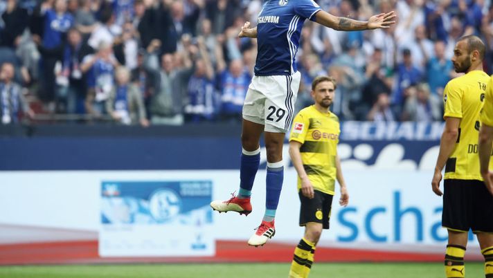 GELSENKIRCHEN, GERMANY - APRIL 15: Naldo of Schalke celebrates his team's second goal during the Bundesliga match between FC Schalke 04 and Borussia Dortmund at Veltins-Arena on April 15, 2018 in Gelsenkirchen, Germany. (Photo by Alex Grimm/Bongarts/Getty Images) GELSENKIRCHEN, GERMANY - APRIL 15: Naldo of Schalke celebrates his team's second goal during the Bundesliga match between FC Schalke 04 and Borussia Dortmund at Veltins-Arena on April 15, 2018 in Gelsenkirchen, Germany. (Photo by Alex Grimm/Bongarts/Getty Images)