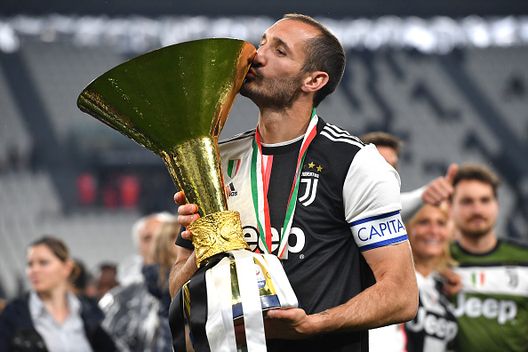 TURIN, ITALY - MAY 19: Giorgio Chiellini of Juventus celebrates during the awards ceremony after winning the Serie A Championship during the Serie A match between Juventus and Atalanta BC on May 19, 2019 in Turin, Italy. (Photo by Tullio M. Puglia/Getty Images) TURIN, ITALY - MAY 19: Giorgio Chiellini of Juventus celebrates during the awards ceremony after winning the Serie A Championship during the Serie A match between Juventus and Atalanta BC on May 19, 2019 in Turin, Italy. (Photo by Tullio M. Puglia/Getty Images)