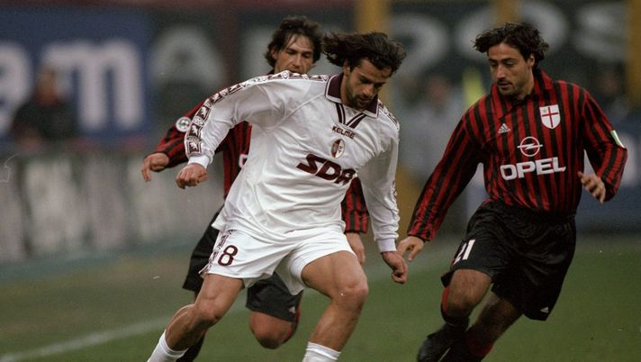 12 Dec 1999: Gianluigi Lentini of Torino is closed down by the AC Milan defence during the Italian Serie A match played at the San Siro in Milan, Italy. The game finished in a 2-0 win for Milan. Mandatory Credit: Claudio Villa /Allsport 12 Dec 1999: Gianluigi Lentini of Torino is closed down by the AC Milan defence during the Italian Serie A match played at the San Siro in Milan, Italy. The game finished in a 2-0 win for Milan. Mandatory Credit: Claudio Villa /Allsport