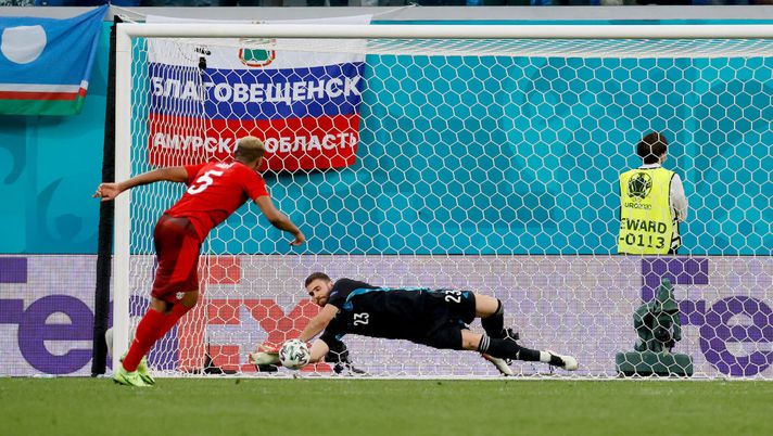 SAINT PETERSBURG, RUSSIA - JULY 02: Manuel Akanji of Switzerland has their side's third penalty saved by Unai Simon of Spain in the penalty shoot out during the UEFA Euro 2020 Championship Quarter-final match between Switzerland and Spain at Saint Petersburg Stadium on July 02, 2021 in Saint Petersburg, Russia. (Photo by Anatoly Maltsev - Pool/Getty Images) SAINT PETERSBURG, RUSSIA - JULY 02: Manuel Akanji of Switzerland has their side's third penalty saved by Unai Simon of Spain in the penalty shoot out during the UEFA Euro 2020 Championship Quarter-final match between Switzerland and Spain at Saint Petersburg Stadium on July 02, 2021 in Saint Petersburg, Russia. (Photo by Anatoly Maltsev - Pool/Getty Images)