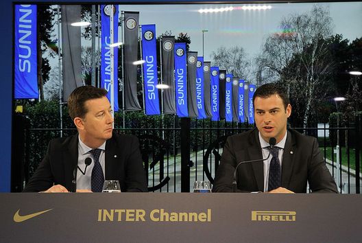 COMO, ITALY - DECEMBER 20:  FC Internazionale Milano Chief Communications Officier Robert Faulkner (L) and FC Internazionale Milano Chief Revenue Officer Michael Gandler (R) speak to the media during a press conference at the Suning Training Center in memory of Angelo Moratti on December 20, 2016 in Como, Italy.  (Photo by Marco Luzzani - Inter/Inter via Getty Images) 