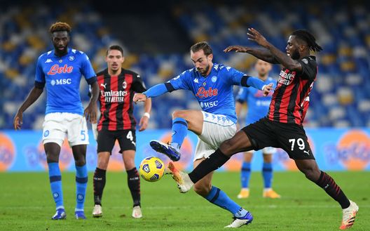 NAPLES, ITALY - NOVEMBER 22: Fabian of S.S.C. Napoli battles for possession with Franck Kessie of A.C. Milan during the Serie A match between SSC Napoli and AC Milan at Stadio San Paolo on November 22, 2020 in Naples, Italy. Sporting stadiums around Italy remain under strict restrictions due to the Coronavirus Pandemic as Government social distancing laws prohibit fans inside venues resulting in games being played behind closed doors. (Photo by Francesco Pecoraro/Getty Images) NAPLES, ITALY - NOVEMBER 22: Fabian of S.S.C. Napoli battles for possession with Franck Kessie of A.C. Milan during the Serie A match between SSC Napoli and AC Milan at Stadio San Paolo on November 22, 2020 in Naples, Italy. Sporting stadiums around Italy remain under strict restrictions due to the Coronavirus Pandemic as Government social distancing laws prohibit fans inside venues resulting in games being played behind closed doors. (Photo by Francesco Pecoraro/Getty Images)