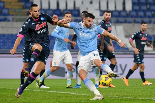 ROME, ITALY - DECEMBER 20: Nikola Maksimovic of SSC Napoli compte for the ball with Ciro Immobile of SS Lazio during the Serie A match between SS Lazio and SSC Napoli at Stadio Olimpico on December 20, 2020 in Rome, Italy. Sporting stadiums around Italy remain under strict restrictions due to the Coronavirus Pandemic as Government social distancing laws prohibit fans inside venues resulting in games being played behind closed doors. (Photo by Marco Rosi - SS Lazio/Getty Images) ROME, ITALY - DECEMBER 20: Nikola Maksimovic of SSC Napoli compte for the ball with Ciro Immobile of SS Lazio during the Serie A match between SS Lazio and SSC Napoli at Stadio Olimpico on December 20, 2020 in Rome, Italy. Sporting stadiums around Italy remain under strict restrictions due to the Coronavirus Pandemic as Government social distancing laws prohibit fans inside venues resulting in games being played behind closed doors. (Photo by Marco Rosi - SS Lazio/Getty Images)