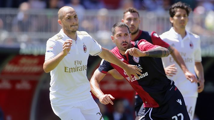 Gabriel Paletta e Marco Borriello durante Cagliari-Milan (credits: GETTY Images) 