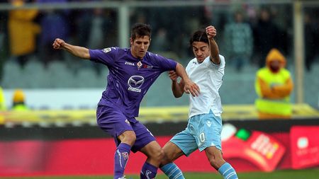 FLORENCE, ITALY - OCTOBER 28: Stevan Jovetic (L) of ACF Fiorentina fights for the ball with Giuseppe Biava of SS Lazio during the Serie A match between ACF Fiorentina and S.S. Lazio at Stadio Artemio Franchi on October 28, 2012 in Florence, Italy. (Photo by Gabriele Maltinti/Getty Images) FLORENCE, ITALY - OCTOBER 28: Stevan Jovetic (L) of ACF Fiorentina fights for the ball with Giuseppe Biava of SS Lazio during the Serie A match between ACF Fiorentina and S.S. Lazio at Stadio Artemio Franchi on October 28, 2012 in Florence, Italy. (Photo by Gabriele Maltinti/Getty Images)