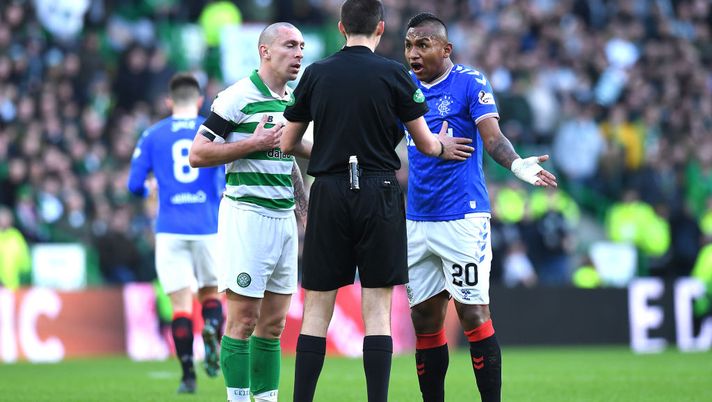 GLASGOW, SCOTLAND - DECEMBER 29: Celtic captain Scott Brown  and Alfredo Morelos of Rangers clash during the Ladbrokes Premiership match between Celtic and Rangers at Celtic Park on December 29, 2019 in Glasgow, Scotland. (Photo by Mark Runnacles/Getty Images) 