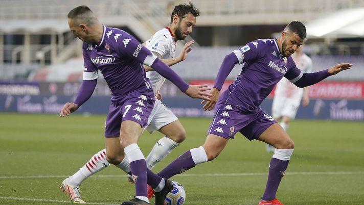 FLORENCE, ITALY - MARCH 21: Franck Ribery (L) and Valentin Eysseric of ACF Fiorentina battles for the ball with Hakan Calhanoglu of AC Milan during the Serie A match between ACF Fiorentina and AC Milan at Stadio Artemio Franchi on March 21, 2021 in Florence, Italy. (Photo by Gabriele Maltinti/Getty Images) FLORENCE, ITALY - MARCH 21: Franck Ribery (L) and Valentin Eysseric of ACF Fiorentina battles for the ball with Hakan Calhanoglu of AC Milan during the Serie A match between ACF Fiorentina and AC Milan at Stadio Artemio Franchi on March 21, 2021 in Florence, Italy. (Photo by Gabriele Maltinti/Getty Images)