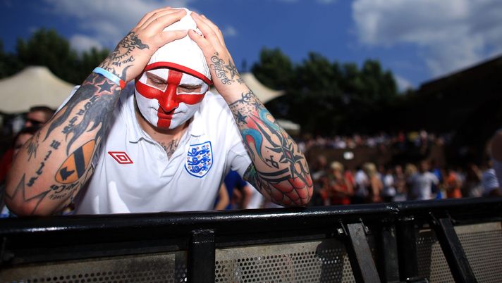 MANCHESTER, ENGLAND - JUNE 27: Fans react as they watch England lose 4-1 to Germany on a giant screen in the Manchester fan zone. on June 27, 2010 in Manchester, England. England were knocked out of the FIFA 2010 World Cup competition by 4 goals to 1 in South Africa (Photo by Christopher Furlong/Getty Images) MANCHESTER, ENGLAND - JUNE 27: Fans react as they watch England lose 4-1 to Germany on a giant screen in the Manchester fan zone. on June 27, 2010 in Manchester, England. England were knocked out of the FIFA 2010 World Cup competition by 4 goals to 1 in South Africa (Photo by Christopher Furlong/Getty Images)