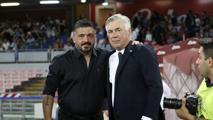 NAPLES, ITALY - AUGUST 25: Coach of SSC Napoli Carlo Ancelotti greets coach of AC Milan Gennaro Gattuso before the serie A match between SSC Napoli and AC Milan at Stadio San Paolo on August 25, 2018 in Naples, Italy. (Photo by Francesco Pecoraro/Getty Images) NAPLES, ITALY - AUGUST 25: Coach of SSC Napoli Carlo Ancelotti greets coach of AC Milan Gennaro Gattuso before the serie A match between SSC Napoli and AC Milan at Stadio San Paolo on August 25, 2018 in Naples, Italy. (Photo by Francesco Pecoraro/Getty Images)