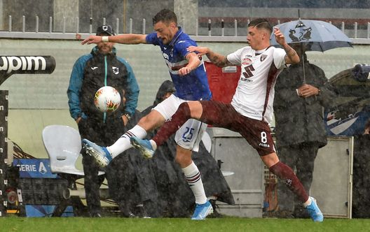  GENOA, ITALY - SEPTEMBER 22: Alex Ferrari of UC Sampdoria and Daniele Baselli of Torino FC during the Serie A match between UC Sampdoria and Torino FC at Stadio Luigi Ferraris on September 22, 2019 in Genoa, Italy. (Photo by Paolo Rattini/Getty Images) 