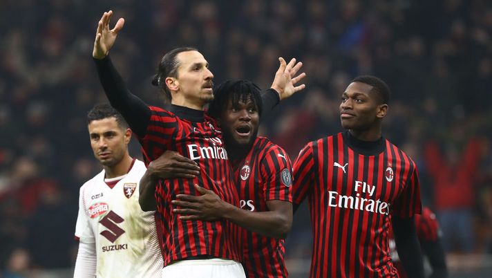 MILAN, ITALY - JANUARY 28:  Zlatan Ibrahimovic (L) of AC Milan celebrates his goal with his team-mates Franck Kessie (C) and Rafael Leao (R) during the Coppa Italia Quarter Final match between AC Milan and Torino at San Siro on January 28, 2020 in Milan, Italy.  (Photo by Marco Luzzani/Getty Images) 