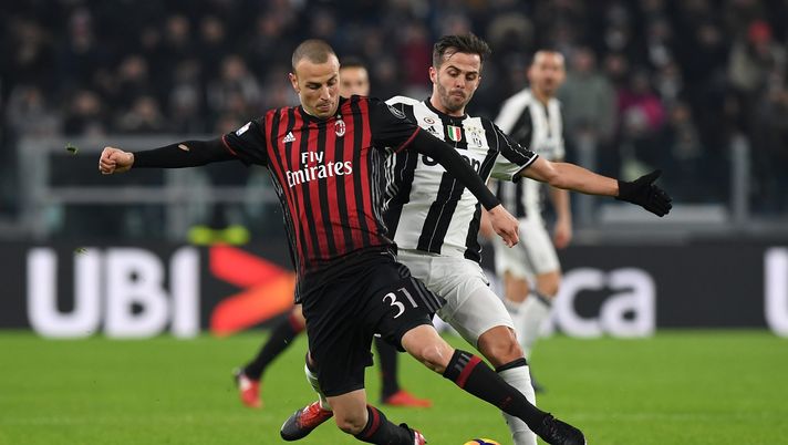 TURIN, ITALY - JANUARY 25: Luca Antonelli (L) of AC Milan is challenged by Miralem Pjanic of Juventus FC during the TIM Cup match between Juventus FC and AC Milan at Juventus Stadium on January 25, 2017 in Turin, Italy. (Photo by Valerio Pennicino/Getty Images) antonelli getty images