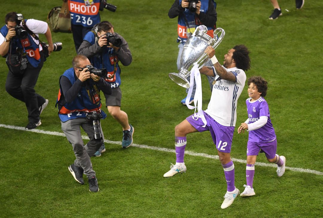  CARDIFF, WALES - JUNE 03:  Marcelo of Real Madrid celebrates with The Champions League trophy  after the UEFA Champions League Final between Juventus and Real Madrid at National Stadium of Wales on June 3, 2017 in Cardiff, Wales.  (Photo by Michael Regan/Getty Images) 